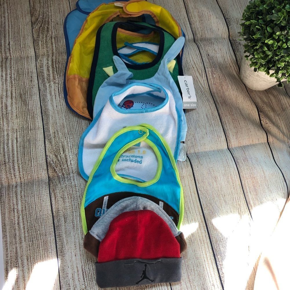 Baby Bundle of 8 includes:  2-Hats and 7 Bibs